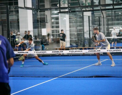 two men playing padel